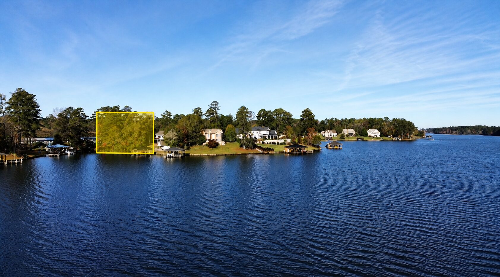 Annotated view from the lake highlighting the 146 Bass Rd lot in yellow